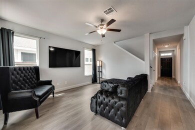 Living room featuring hardwood / wood-style floori