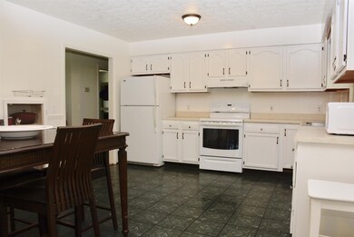 Lots of counter space and cabinets in this kitchen
