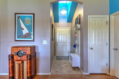 The Vaulted Entryway offers Abundant Light plus Ne