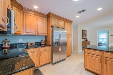 Real wood cabinets with plenty of storage.