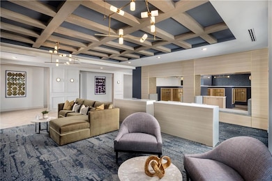 Lobby with coffered ceiling and beam ceiling