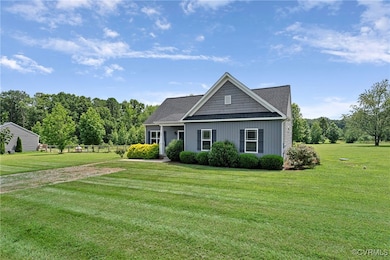 View of front facade with a front yard