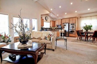 Main living space is open to chef's kitchen, dinin