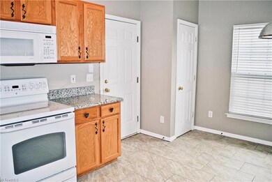 Eat-in kitchen area.  Garage door leads straight into kitchen.  Convenient to unload groceries!