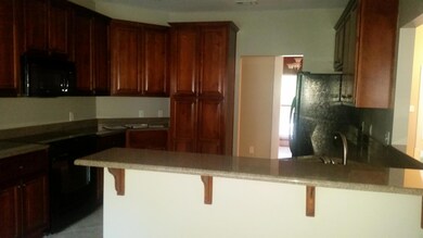 custom kitchen with granite