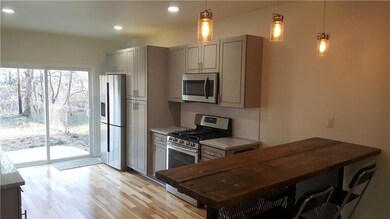 Fully equipped kitchen with exit onto new cement p