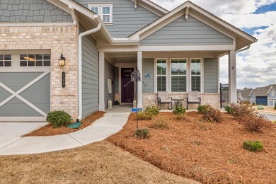 Craftsman inspired home with a porch and a garage