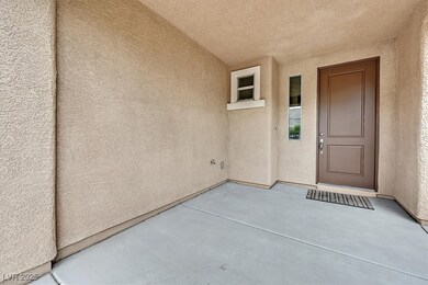 Property entrance featuring stucco siding