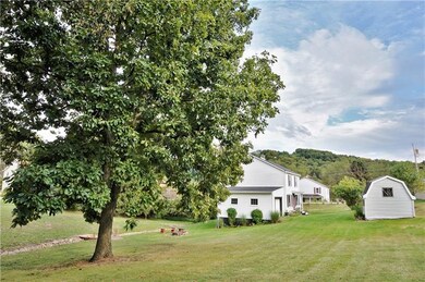 large shade tree, this yard is perfect for a ball 