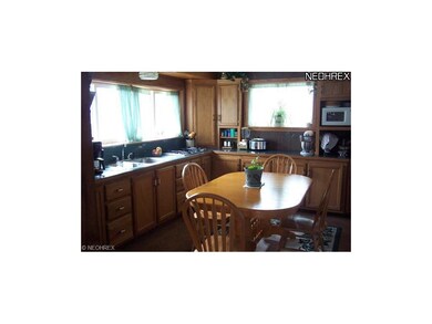 updated eat-in kitchen with tons of cabinets and n
