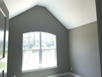 Guest bedroom with vaulted ceilings!