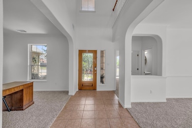 Entrance foyer with visible vents, light colored 
