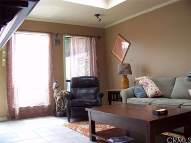 Another view of the living room with large vertica