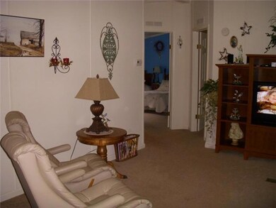 This home offers a large formal living room.