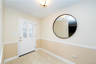 Large Foyer with fresh paint, and new front door!