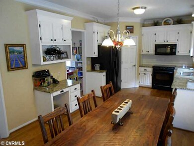 Kitchen - Renovated kitchen with hardwood floors, 