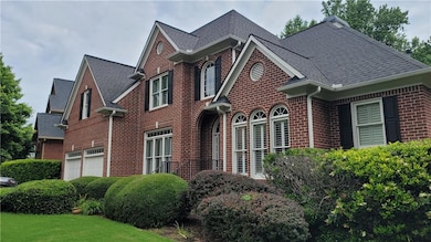 View of front of property featuring brick siding, 