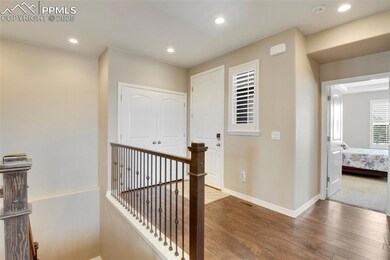 The welcoming front entryway with laminate flooring includes a large coat closet.