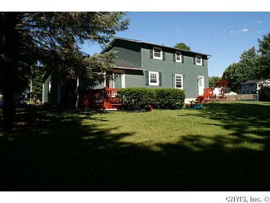 Exterior Front. Large backyard showing landscaped 