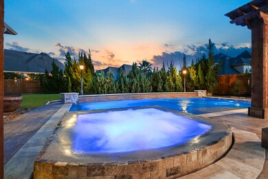 This backyard oasis is well designed with beautiful landscaping and greenspace for this large lot. Who says you can't have it all!