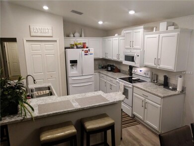 Kitchen view over the bar counter with updated Hig