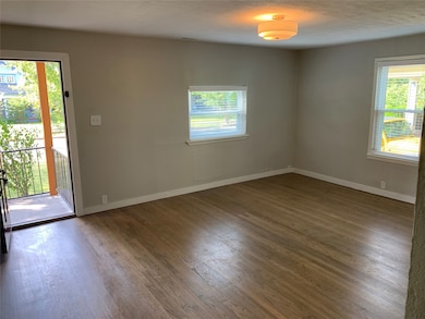 Living room with original hardrood floors