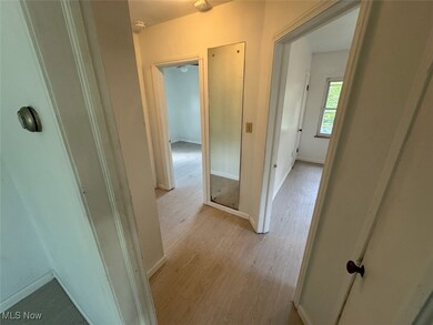 Hall featuring light hardwood / wood-style floors