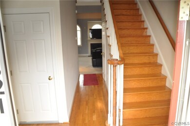 Entrance:Foyer leading  to upstairs, and down to basement, and straight ahead to family room or to your left the living room.