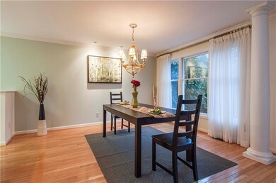 Wall of windows in formal dining room.
