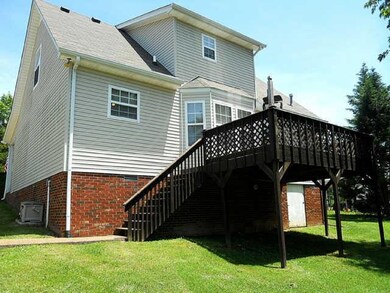 Nice deck overlooks huge back yard, suitable for gardening, kids & critters. Large crawl space has lots of room for storage.