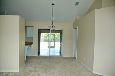 Living room looking towards kitchen on the left an