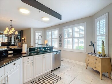 Kitchen featuring a wealth of natural light, stain