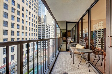 A large private balcony over looking Main St is a