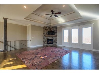 Fireplace has stone to the ceiling. Very impressiv