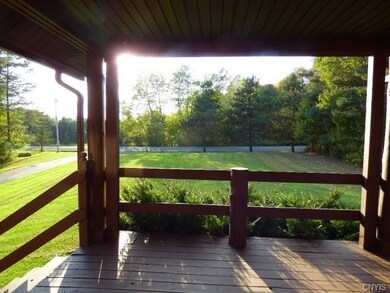 This front porch is waiting for your rocking chair