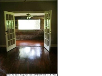 As you pass thru the French doors from the living 