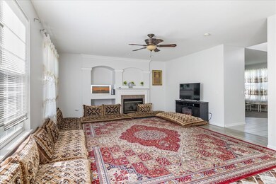 Large dining/family room with fireplace.