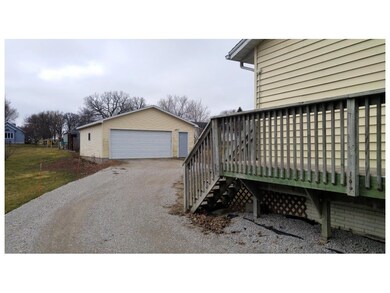 View of over-sized 2 stall garage from side entry 