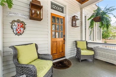 Entrance to property with covered porch