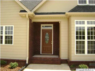 An elegant entrance to this beautifull home with a covered front porch.