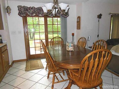 Kitchen Dining. Sliding glass doors to patio and h