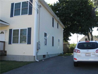 Exterior Front. Driveway for both units.