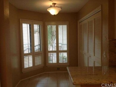 Eat in Kitchen with washer and dryer in cabinet