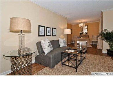 The formal living room is located off of the foyer
