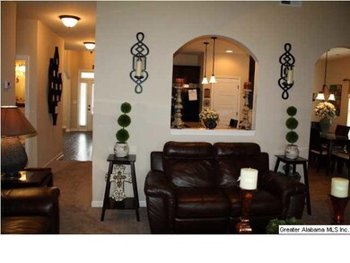 Greatroom looking into the Kitchen and hallway. Ve