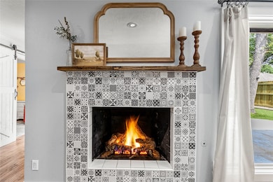 Custom tiled fireplace as focal point of the home.