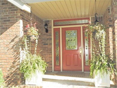 Front entrance allows additional light into living room