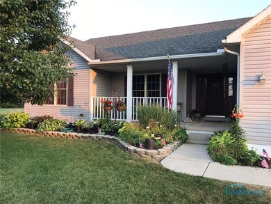 Beautiful landscaping as you enter the home.