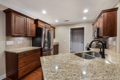 This kitchen is beautiful and functional. All appliances convey.