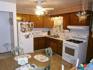 EAT-IN-KITCHEN WITH ACCESS TO A 26' COVERED REAR P